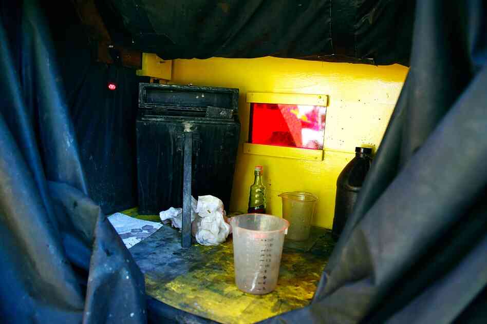 To work like Gardner did in the field, the photographer needs a portable darkroom. The interior of Todd Harrington's is like an alchemist's laboratory.