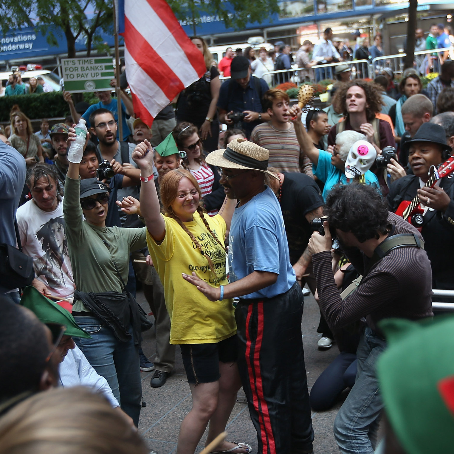 Protesters dance in Zuccotti Park on the one-year anniversary of the Occupy Wall Street movement.
