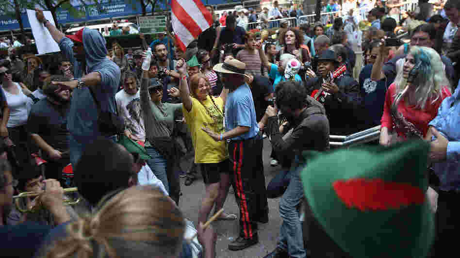 Protesters dance in Zuccotti Park on the one-year anniversary of the Occupy Wall Street movement.
