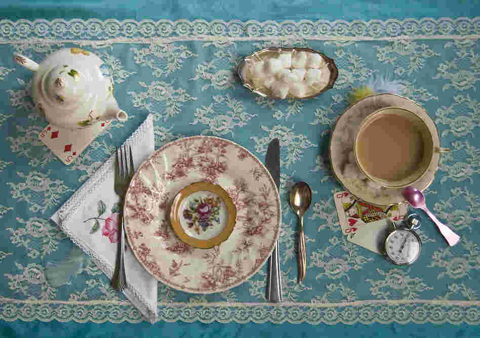 "There was a table set out under a tree in front of the house, and the March Hare and the Hatter were having tea at it ..." (Alice in Wonderland)