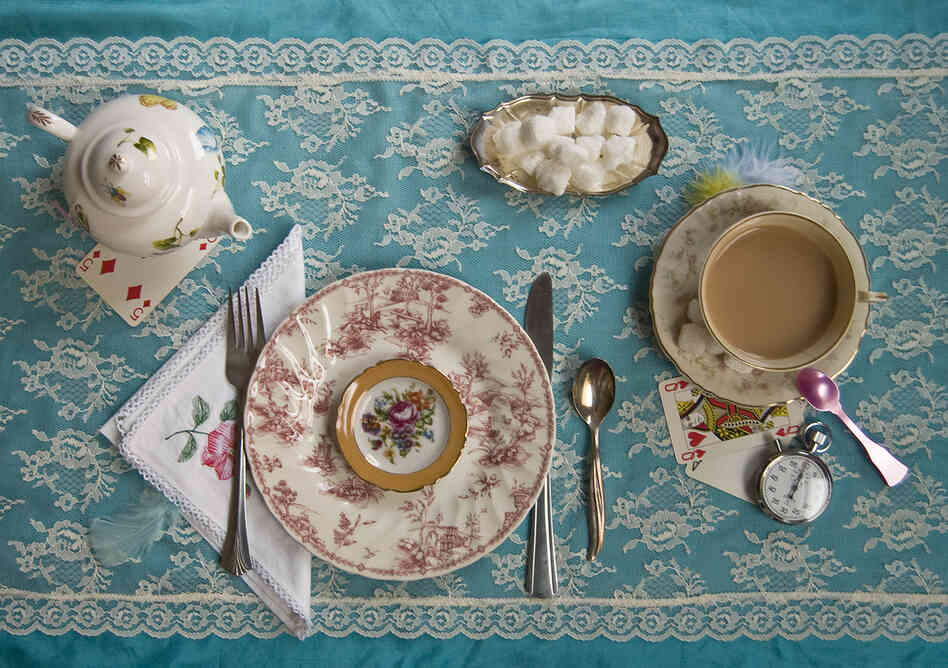"There was a table set out under a tree in front of the house, and the March Hare and the Hatter were having tea at it ..." (Alice in Wonderland)