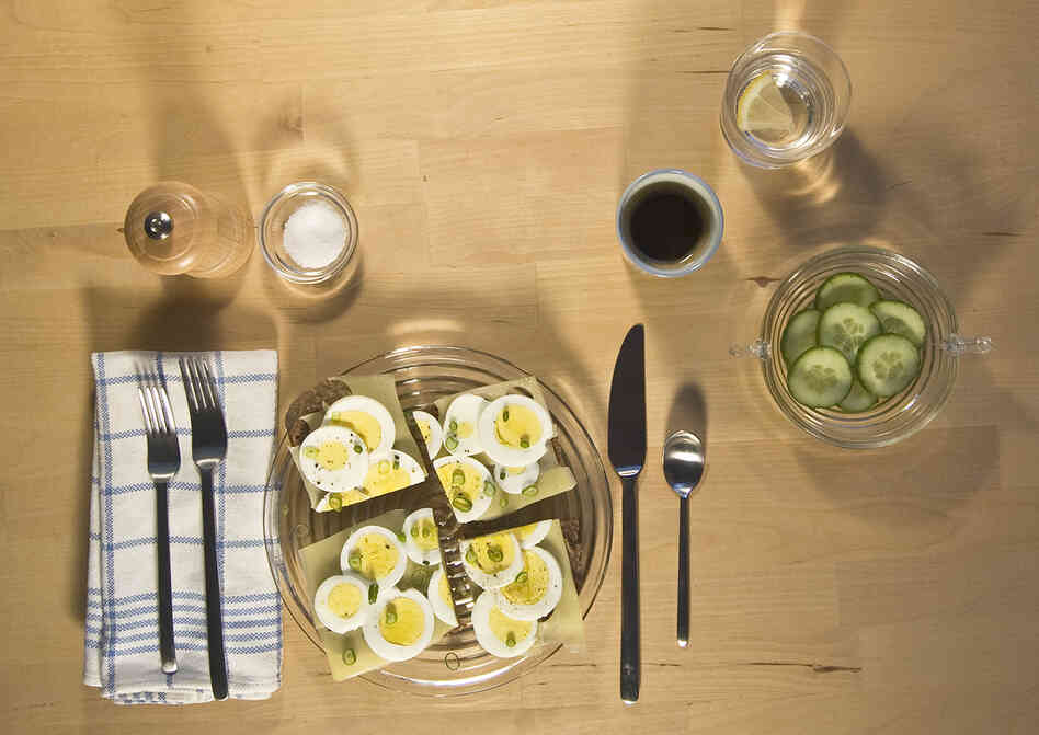 "Then he made himself lunch, which consisted of coffee and open sandwiches, and sat in the garden, where he was typing up the notes of his conversation with Pastor Falk." (The Girl With the Dragon Tattoo)