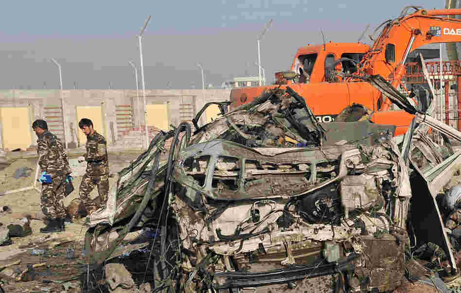 A suicide bomber struck a convoy of buses today in Kabul, killing at least 12 people — mostly foreigners.
