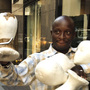 Senegalese vendor Cheikh Fall prepares his stall in front of Brooks Brothers on 51st Street, just off the Avenue of the Americas in New York City. Fall runs an association of Senegalese vendors that deals with the city over licensing and regulations.