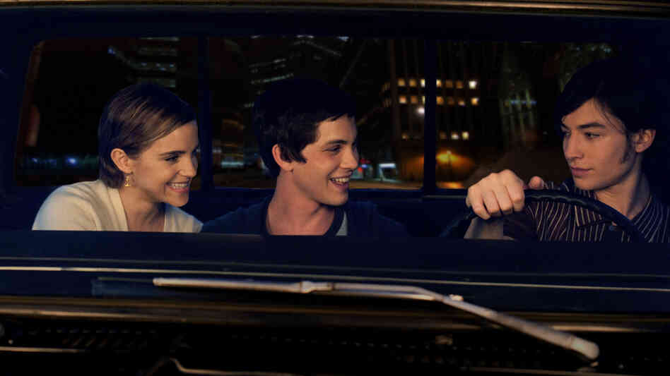 Sam (Emma Watson), Charlie (Logan Lerman) and Patrick (Ezra Miller) help each other through the lowest parts of high school in The Perks of Being a Wallflower. Sam (Emma Watson), Charlie (Logan Lerman) and Patrick (Ezra Miller) help each other through the lowest parts of high school in The Perks of Being a Wallflower.