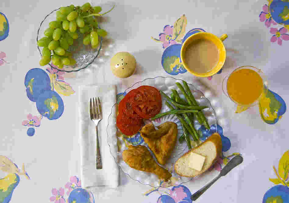 "The kitchen table was loaded with enough food to bury the family: hunks of salt pork, tomatoes, beans, even scuppernongs." (To Kill a Mockingbird)