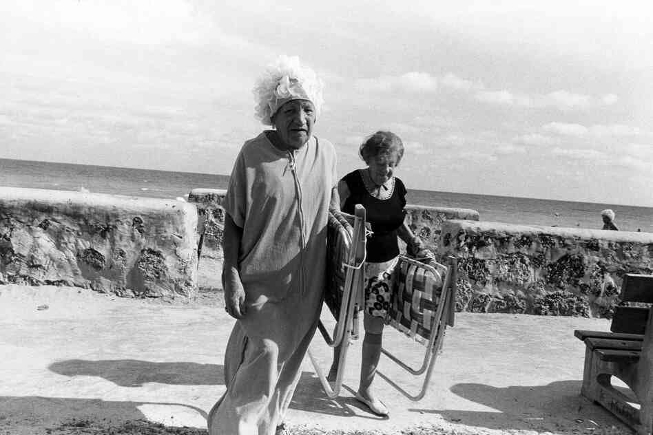 Women leaving beach, South Beach, Miami Beach, 1977
