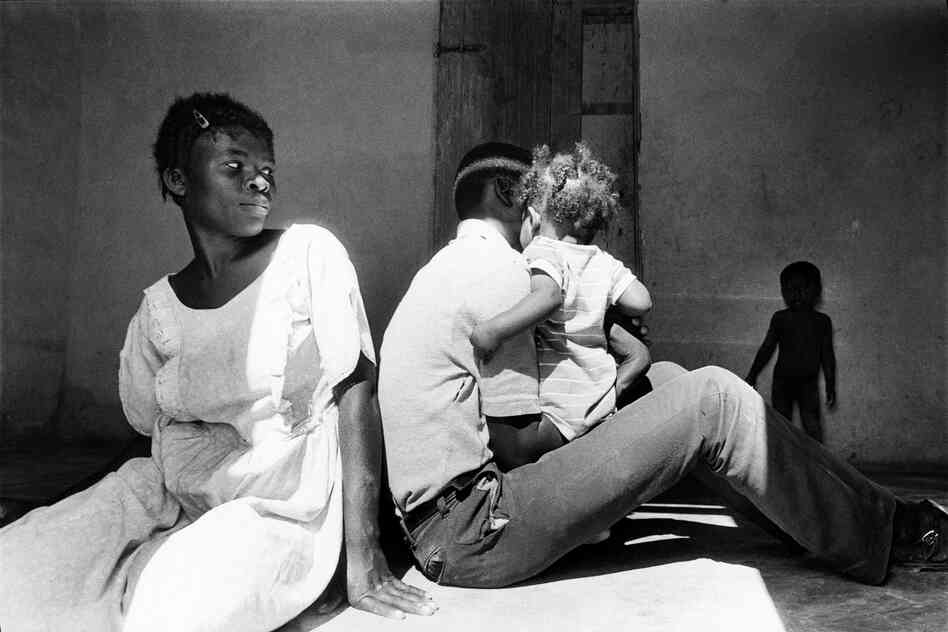 Family in room, Carrefour, Haiti, 1986