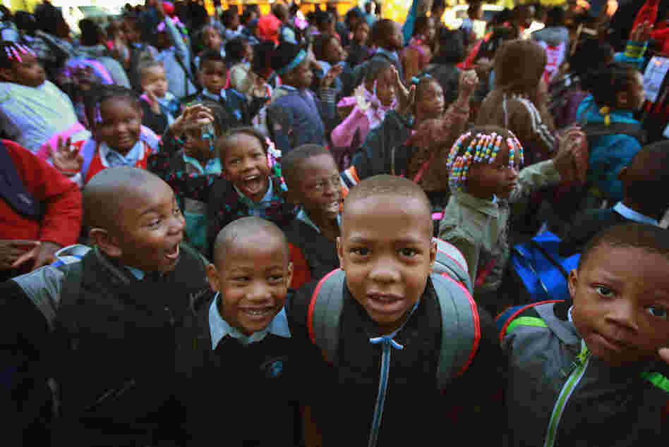 Students at Frazier International Magnet School wait outside before the start of school on Wednesday in Chicago.