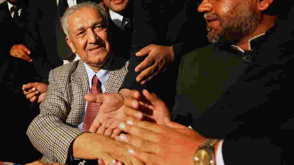 Abdul Qadeer Khan, regarded as the father of Pakistan's nuclear bomb, shakes hands with supporters at the Rawalpindi High Court in 2010. The controversial Khan, who sold nuclear secrets to Iran and North Korea, is now entering politics.