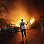 The U.S. Consulate in Benghazi, Libya, was in flames during an attack on Sept. 11. There are competing narratives on whether the attack was premeditated.