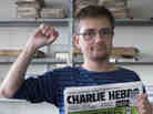 At the offices of the French satirical weekly Charlie Hebdo earlier today, publisher/editor Stephane Charbonnier ("Charb") struck a defiant pose.