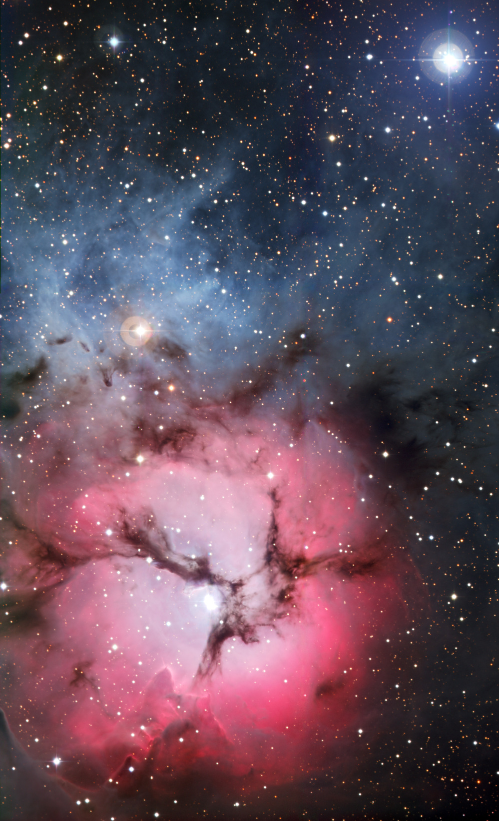 A portal to another universe? No, just the Trifid Nebula, a massive star factory. This amazing image was captured by the European Southern Observatory's La Silla facility in northern Chile.