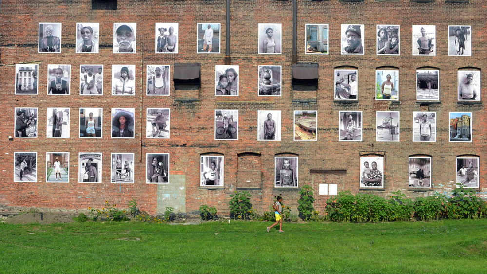 Kasterine's photographs are seen on the wall of of the Ritz Theater in Newburgh, N.Y.