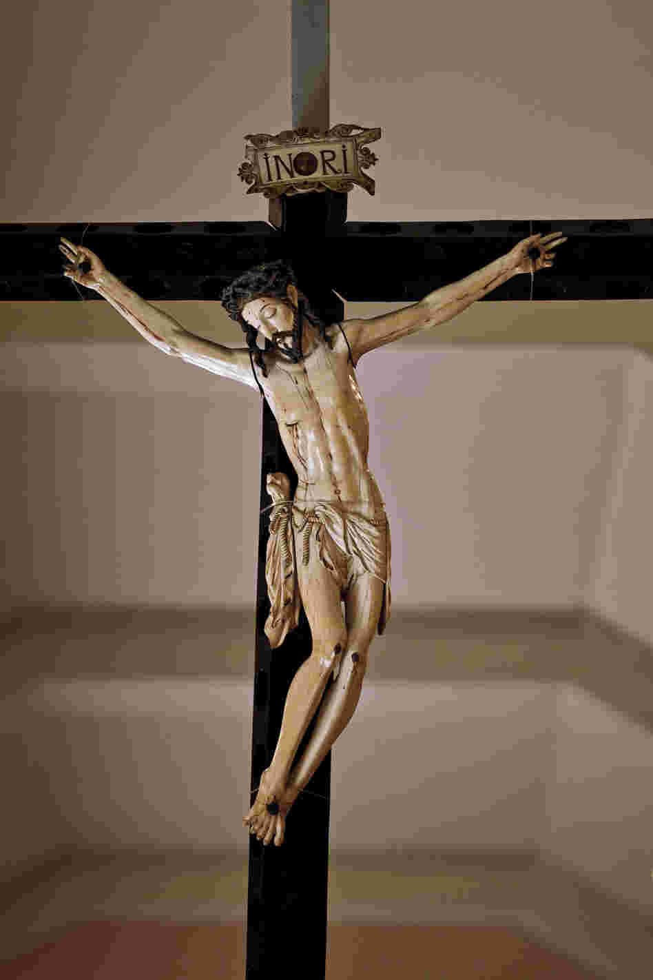 "The largest ivory crucifix in the Philippines hangs in a museum in Manila. The body of Christ, 30 inches long, is carved from a single tusk. The piece dates to the early 1600s, when Spanish galleons began bringing Asian ivory craftsmanship to Spain and the New World."