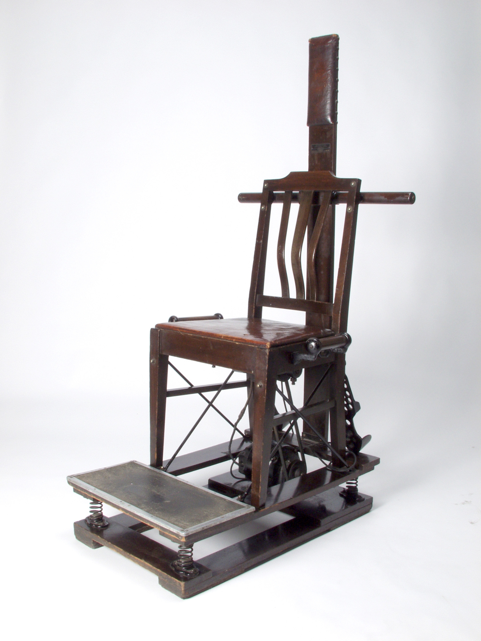The Kellogg Vibratory Chair.  Though it looks like an instrument of capital punishment, this electric-powered chair was reputed to cure constipation and improve respiration.  The chair shook and rattled so violently that patients had to hold firmly onto side handles.