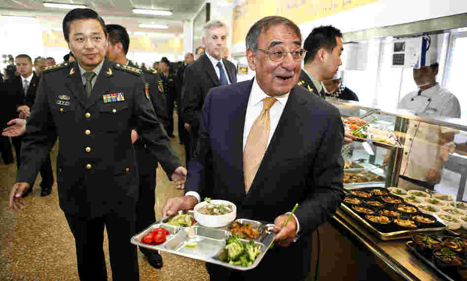 U.S. Defense Secretary Leon Panetta has lunch with engineering cadets at the Chinese military academy in Beijing on Wednesday. Just before Panetta's arrival for talks with top leaders, China released photos of a new stealth fighter under development.