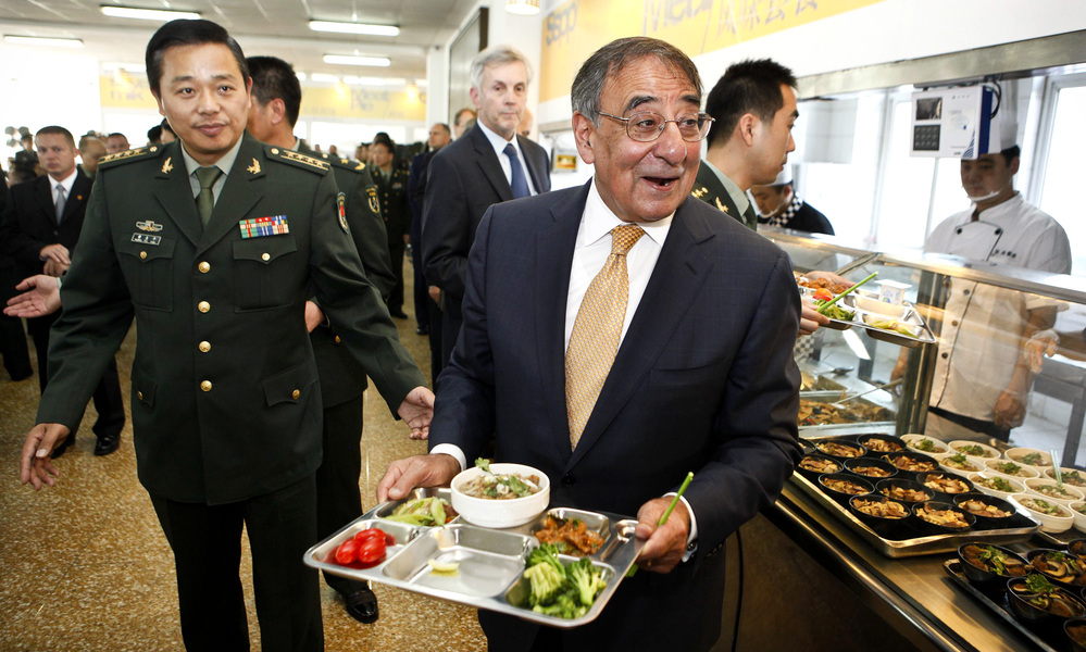 U.S. Defense Secretary Leon Panetta has lunch with engineering cadets at the Chinese military academy in Beijing on Wednesday. Just before Panetta's arrival for talks with top leaders, China released photos of a new stealth fighter under development.