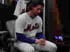 Pitcher R.A. Dickey sits in the Mets' locker room in the film Knuckleball! Pitcher R.A. Dickey sits in the Mets' locker room in the film Knuckleball!
