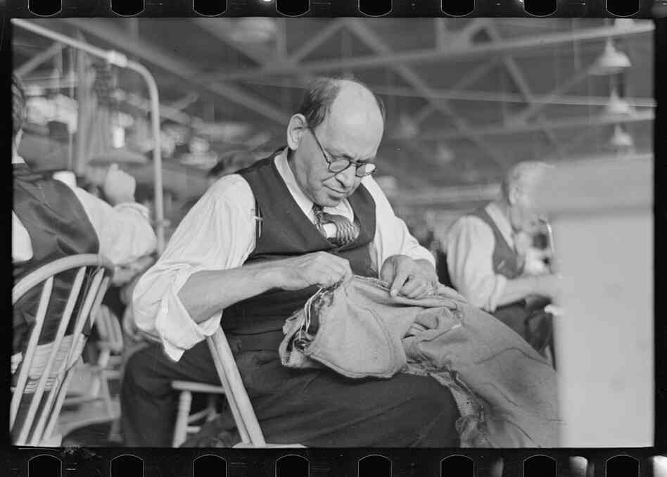Barry Leving worked as a tailor in the cooperative garment factory in Jersey Homesteads. This town was one of 99 towns set up by the National Industrial Recovery Act in the midst of the economic crisis in the 1930s, and was later renamed Roosevelt, after the president who set up these 'New Deal' towns. The photographs in this slideshow were taken in the early days of the town.