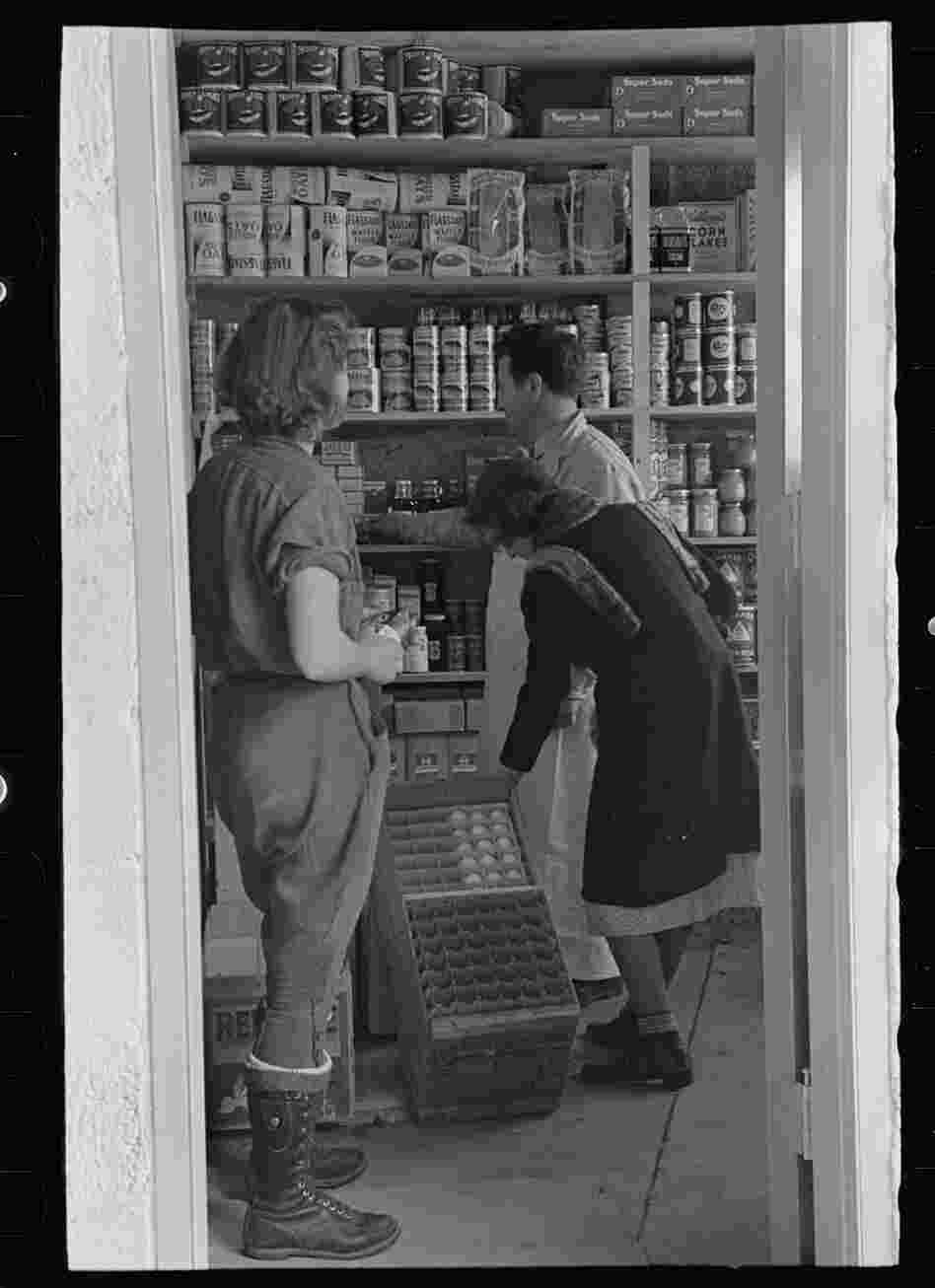 Residents shopped at local cooperative stores in town. This was one of the first, the more permanent home of the shop Nathan Dubin ran out of a garage.