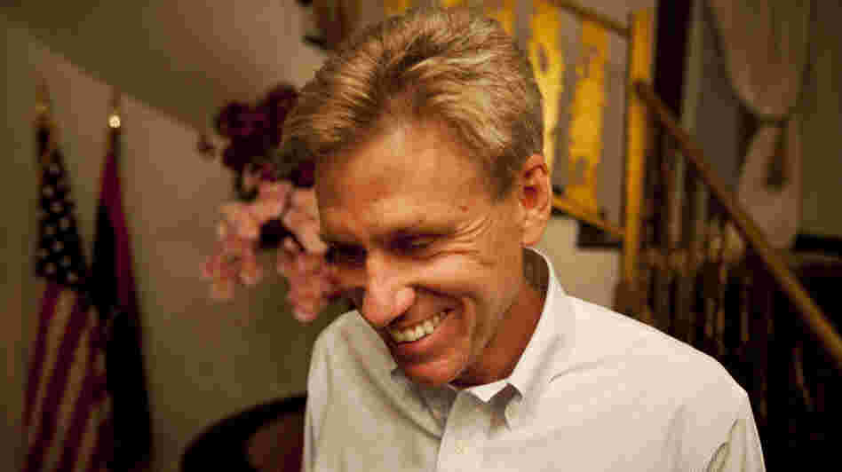 U.S. officials and Libyan militiamen met to discuss the deteriorating security in Benghazi just two days before the attack that killed Ambassador Chris Stevens and three other Americans. Stevens is shown here at the consulate in June.