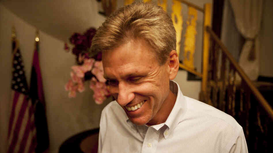 U.S. officials and Libyan militiamen met to discuss the deteriorating security in Benghazi just two days before the attack that killed Ambassador Chris Stevens and three other Americans. Stevens is shown here at the consulate in June.