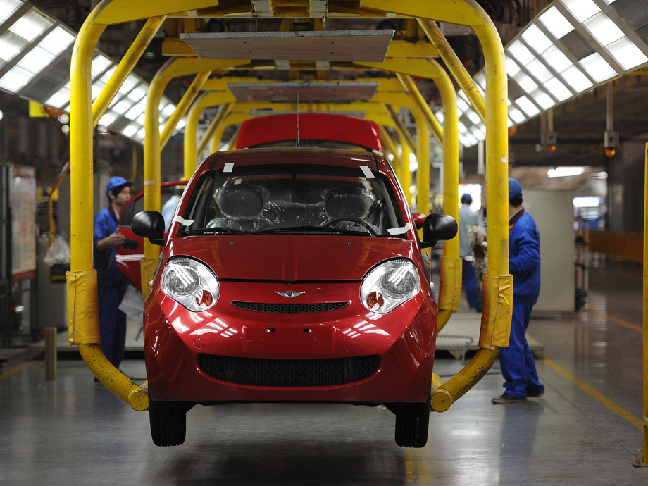 Workers assemble one of the many car models at Chinese carmaker's Chery Automobile plant in Wuhu, east China's Anhui province.