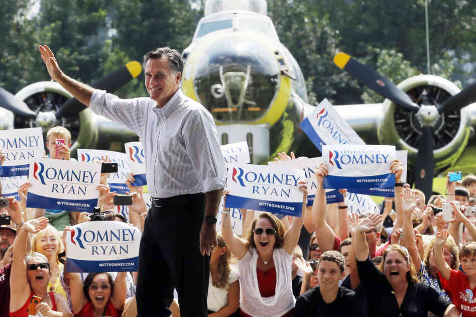 Mitt Romney takes the stage at a campaign rally at the Military Aviation Museum in Virginia Beach, Va., on Sept. 8.