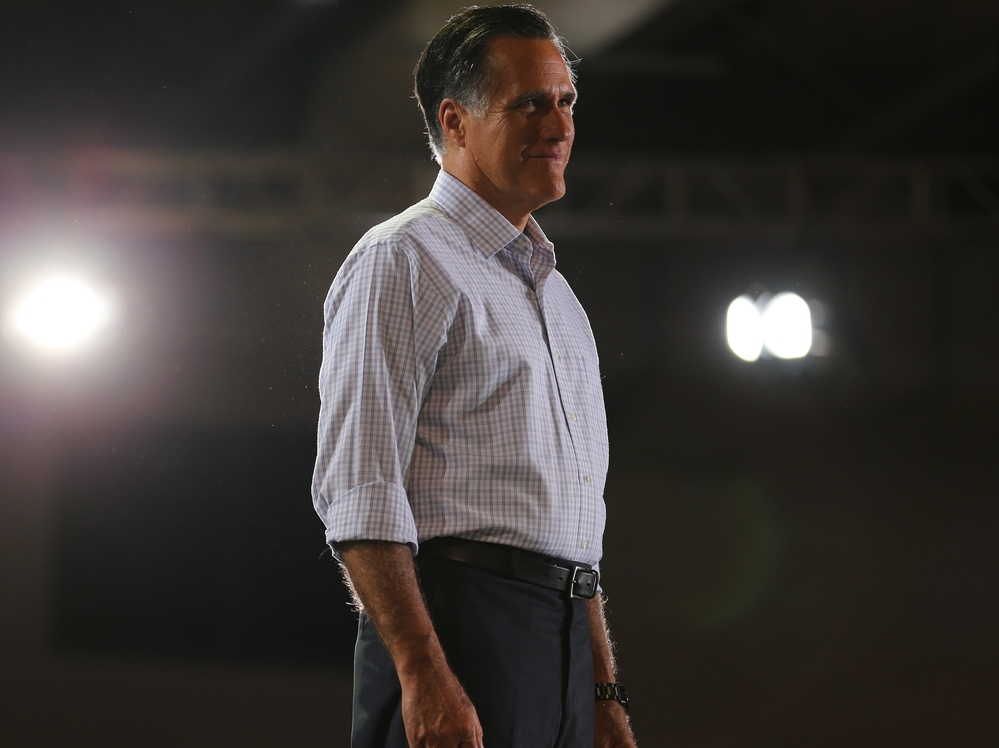 Mitt Romney stands on stage during a Juntos Con Romney Rally on September 19, 2012 in Miami.