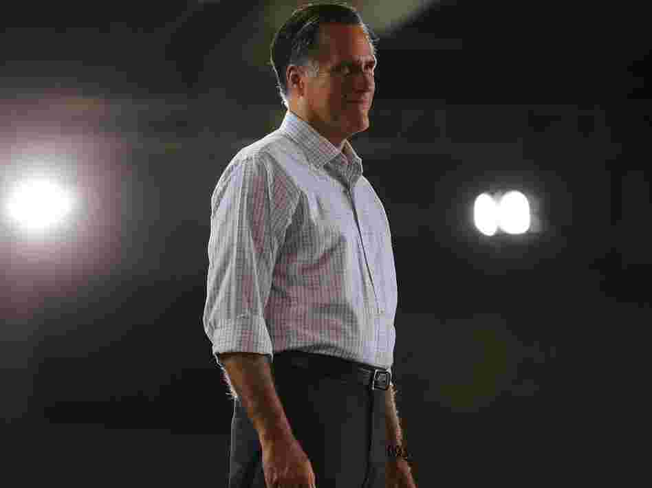 Mitt Romney stands on stage during a Juntos Con Romney Rally on September 19, 2012 in Miami.
