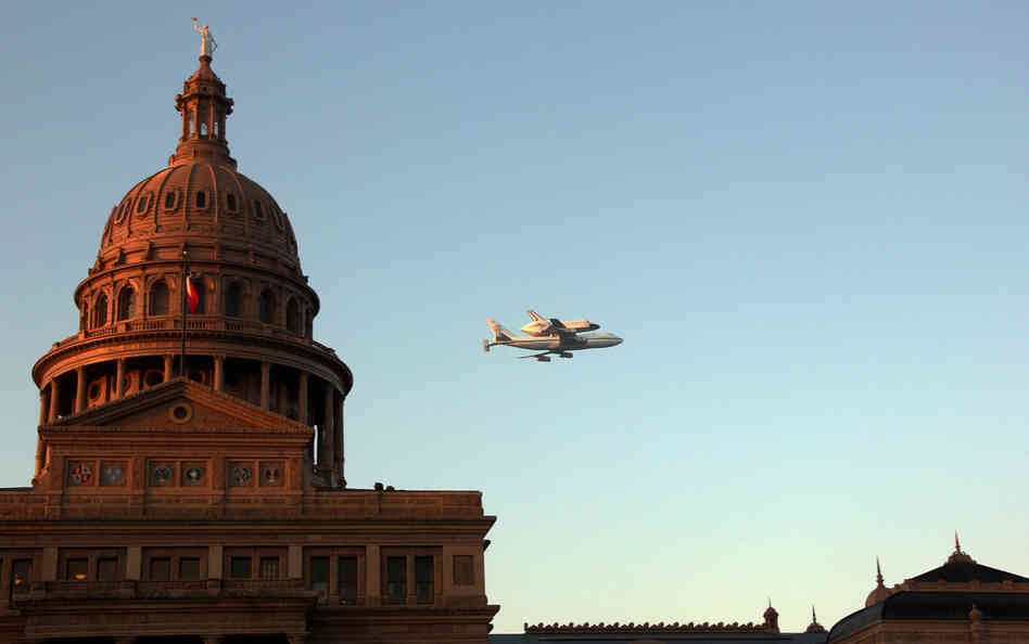 Space Shuttle Endeavour sits atop the shuttle aircraft carrier, flies over downtown Austin, Texas early Thursday. Space Shuttle Endeavour sits atop the shuttle aircraft carrier, flies over downtown Austin, Texas early Thursday.