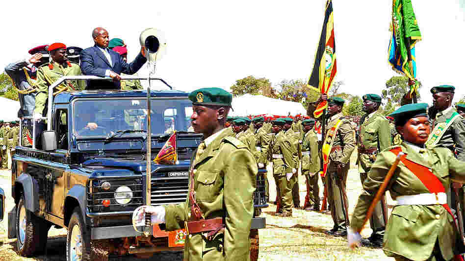 President Yoweri Museveni inspects Ugandan troops at a ceremony honoring Rwandan President Paul Kagame in January of this year.