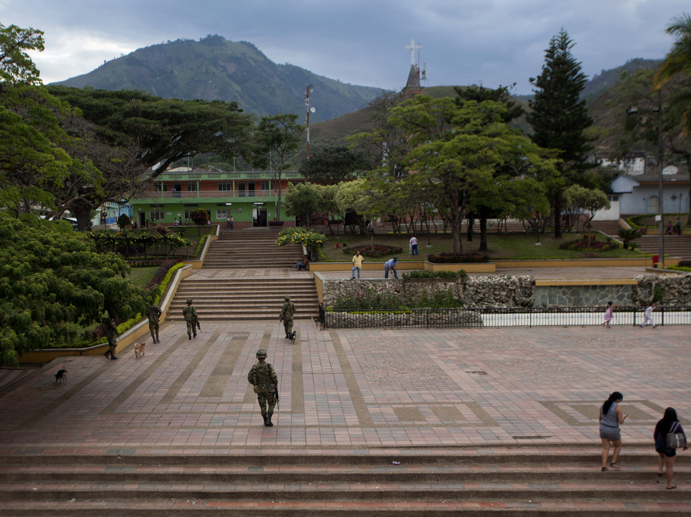 Colombian soldiers patrol the town of Planadas on Sept. 6. The military has stepped up its presence in Tolima state.