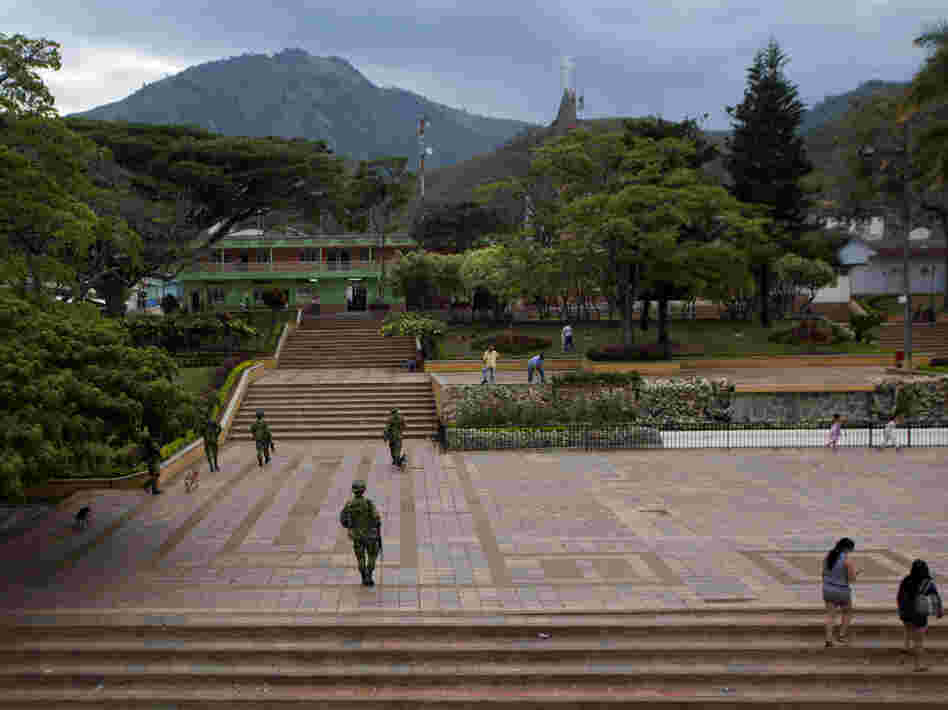 Colombian soldiers patrol the town of Planadas on Sept. 6. The military has stepped up its presence in Tolima state.