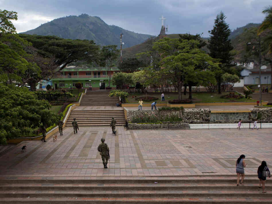 Colombian soldiers patrol the town of Planadas on Sept. 6. The military has stepped up its presence in Tolima state.