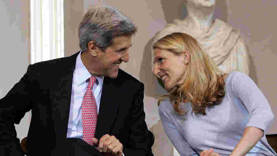 Dr. Vanessa Kerry talks with her father, Sen. John Kerry, before he delivers a speech on health care in Boston.