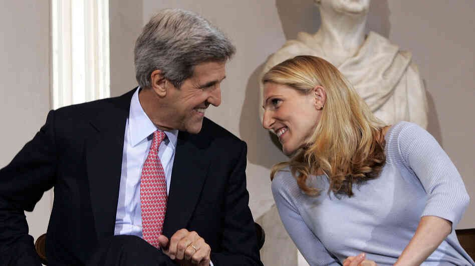 Dr. Vanessa Kerry talks with her father, Sen. John Kerry, before he delivers a speech on health care in Boston.