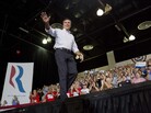 Mitt Romney waves to supporters as he arrives at a rally Friday in Las Vegas. Mitt Romney waves to supporters as he arrives at a rally Friday in Las Vegas.