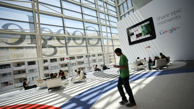 A Google logo is seen through windows of Moscone Center in San Francisco during Google's annual developer conference, Google I/O, in June. Google is one of several major tech companies known for the "acqui-hire."