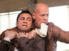 Joseph Gordon-Levitt and Bruce Willis star as present and future versions of the same man in Looper. Joseph Gordon-Levitt and Bruce Willis star as present and future versions of the same man in Looper.
