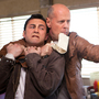 Joseph Gordon-Levitt and Bruce Willis star as present and future versions of the same man in Looper. Joseph Gordon-Levitt and Bruce Willis star as present and future versions of the same man in Looper.