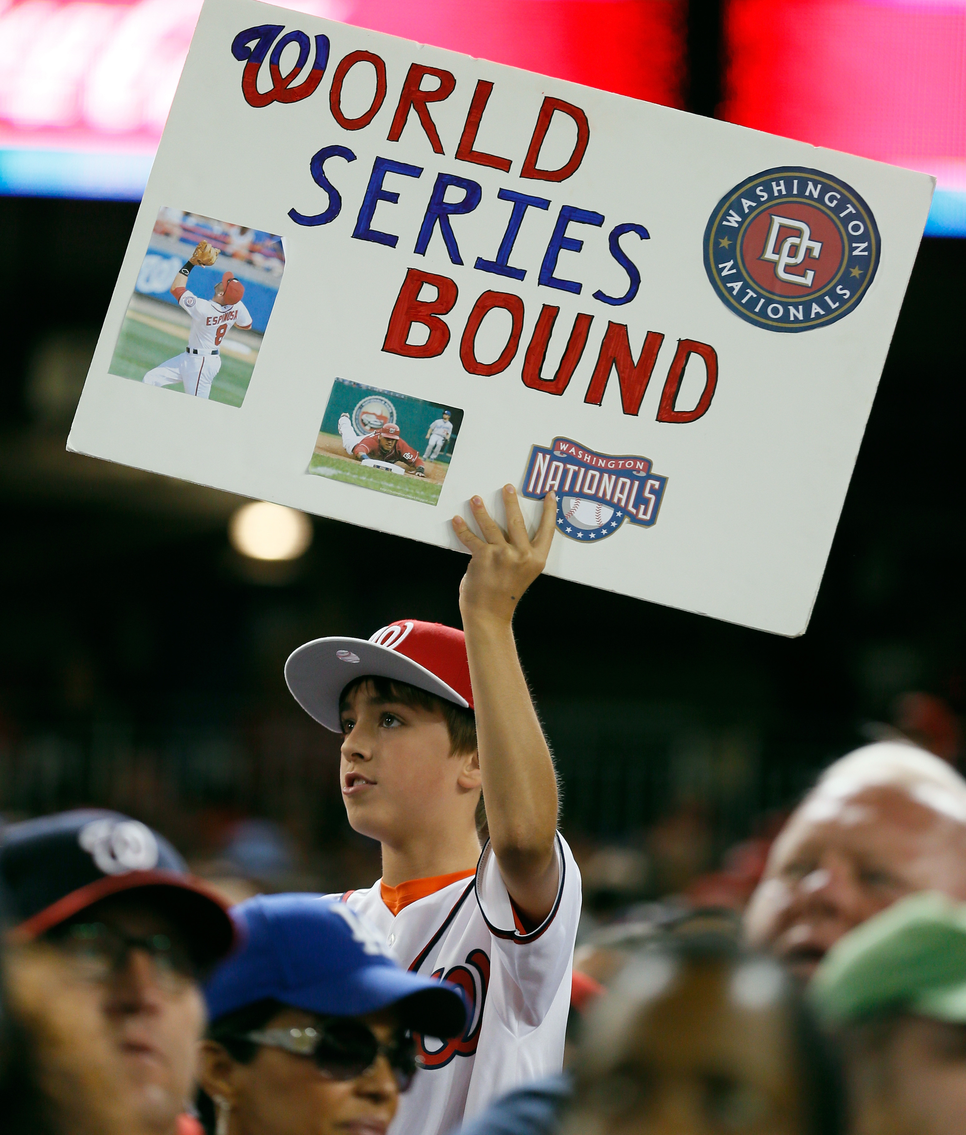 Hoping for the most: A Washington Nationals fan at Thursday night's game in D.C., when the team clinched a playoff spot.