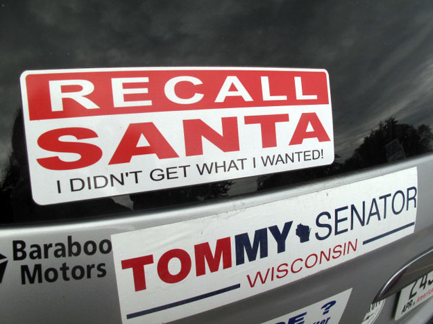 A bumper sticker on the car of Bob Greenwood of Baraboo, Wis. "Recall Santa" reflects the bitterly divisive recall election this year, which Republican Gov. Scott Walker survived easily.
