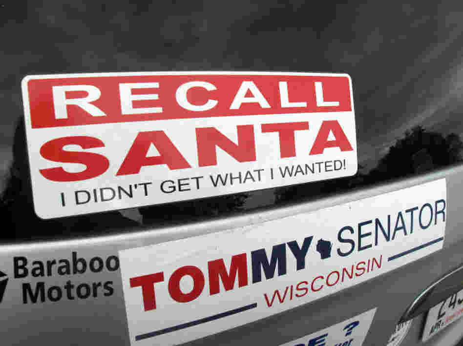 A bumper sticker on the car of Bob Greenwood of Baraboo, Wis. "Recall Santa" reflects the bitterly divisive recall election this year, which Republican Gov. Scott Walker survived easily.