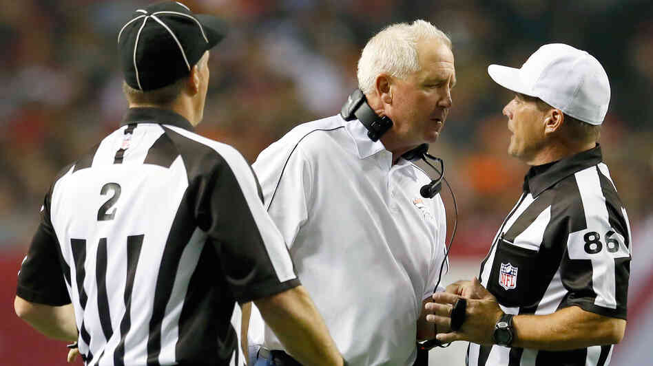 Denver Broncos Coach John Fox yells at field judge Jimmy Buchanan during the Broncos' game against Atlanta Monday. Referring to the game, the NFL insisted that players and coaches give replacement referees, and the game, more respect.