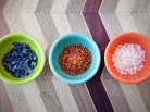 The Salt's most colorful salts. From left to right: Cypress black lava, red Hawaiian, and pink Bolivian rose. The Salt's most colorful salts. From left to right: Cypress black lava, red Hawaiian, and pink Bolivian rose.