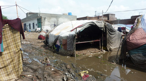 In an urban slum of Pakistan, the population is highly transient. People will raise a cloth tent one day, stay a little while and then move on.