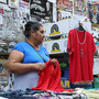 Unemployment is rampant in Spain and full-time jobs are scarce. Here a woman works at a street stall in Madrid. Some Spaniards are signing up for "time banks," where individuals perform services based on their skills, and receive another service in return. No money changes hands. A woman is shown here working at a street stall in Madrid. Unemployment is rampant in Spain and full-time jobs are scarce. Here a woman works at a street stall in Madrid. Some Spaniards are signing up for "time banks," where individuals perform services based on their skills, and receive another service in return. No money changes hands. A woman is shown here working at a street stall in Madrid.