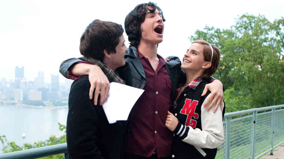 Charlie (Logan Lerman), Patrick (Ezra Miller) and Sam (Emma Watson) navigate the joys and pains of high school in The Perks of Being a Wallflower. Charlie (Logan Lerman), Patrick (Ezra Miller) and Sam (Emma Watson) navigate the joys and pains of high school in The Perks of Being a Wallflower.